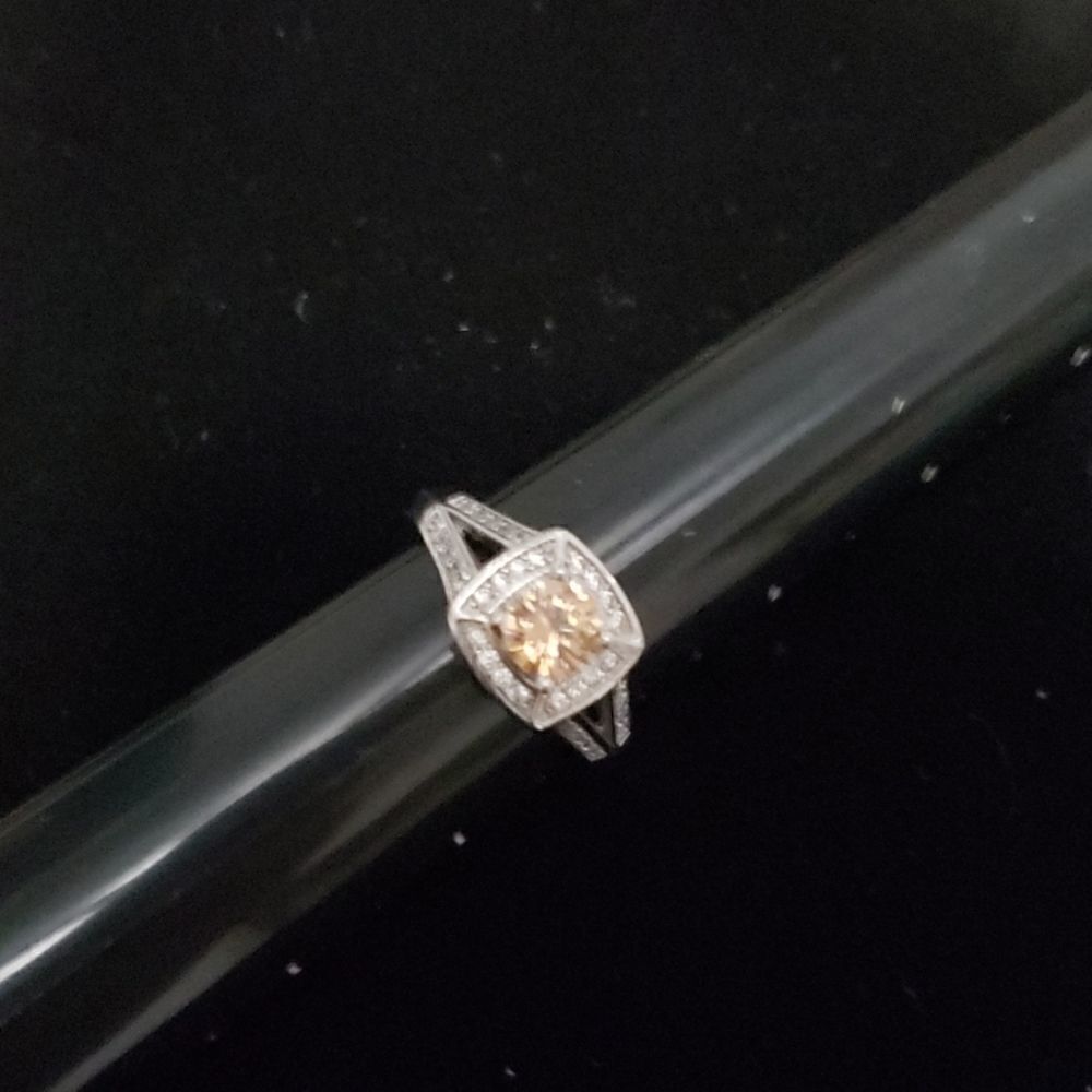 New topaz Square cut with halo design